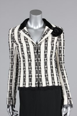 Lot 115 - A Chanel black and white striped tweed summer...