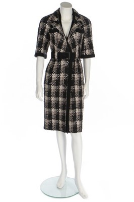 Lot 39 - A Chanel gold and black tweed coat-dress,...