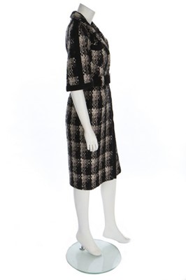 Lot 39 - A Chanel gold and black tweed coat-dress,...