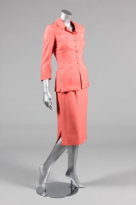 Lot 49 - An Irene salmon-pink shantung suit, 1950s,...