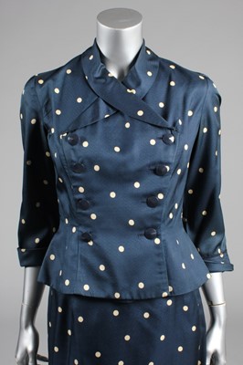 Lot 52 - A Forman & Gumner of Boston petrol blue polka...