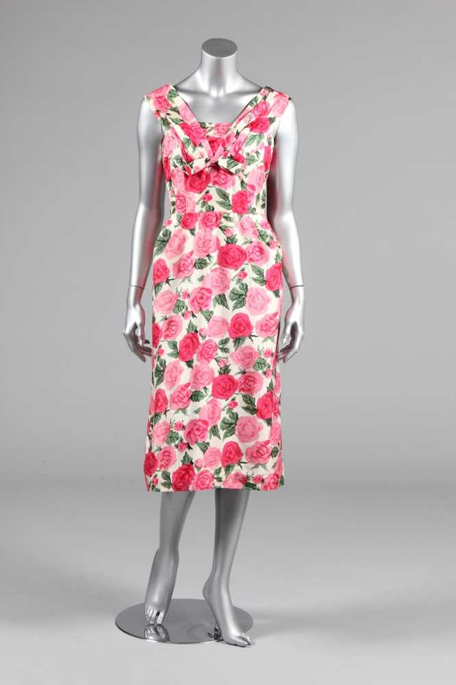 Lot 61 - A figure-hugging rose printed silk dress, late...