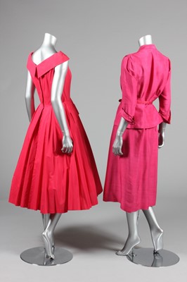 Lot 61 - A figure-hugging rose printed silk dress, late...