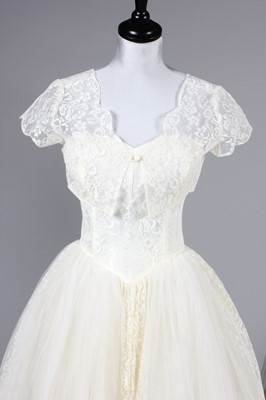 Lot 65 - Four bridal gowns, 1940s-early 60s, including...