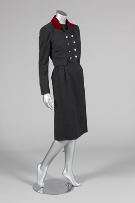 Lot 75 - An Oleg Cassini steel-grey wool dress-suit...