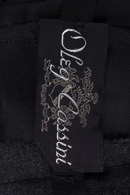 Lot 75 - An Oleg Cassini steel-grey wool dress-suit...