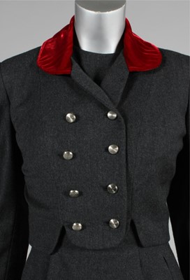 Lot 75 - An Oleg Cassini steel-grey wool dress-suit...