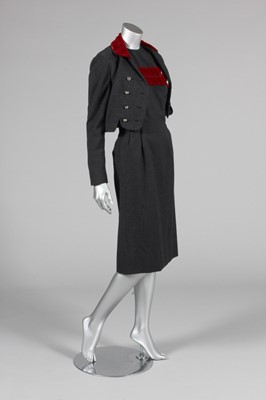 Lot 75 - An Oleg Cassini steel-grey wool dress-suit...