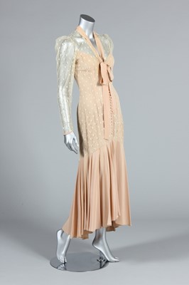 Lot 78 - An Alice Pollock ivory net and pink rayon...