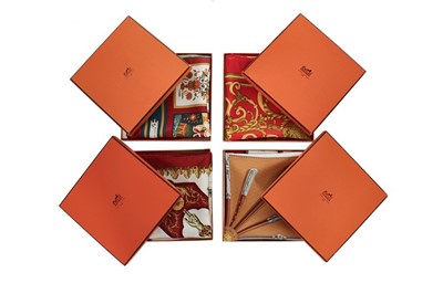 Lot 259 - Four Hermès printed silk scarves, 1990s-2000s,...