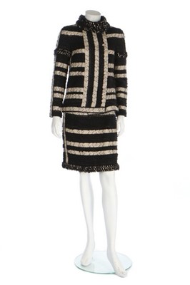 Lot 40 - A Chanel striped tweed suit, Pre-Fall 2009,...