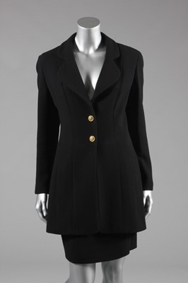 Lot 158 - A Chanel black wool suit, 1994, boutique...