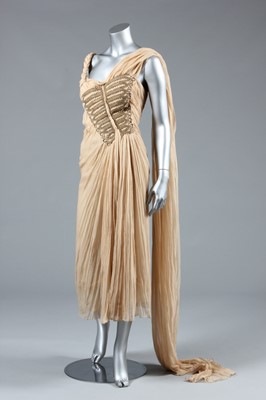 Lot 176 - An Alexander McQueen beige chiffon cocktail...