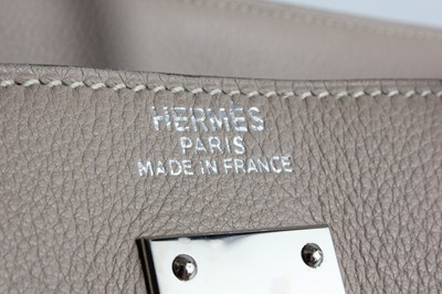 Lot 12 - An Hermès gris tourterelle clemence leather...