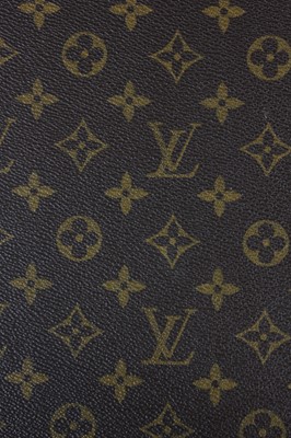 Lot 11 - A Louis Vuitton hard-sided suitcase, with...