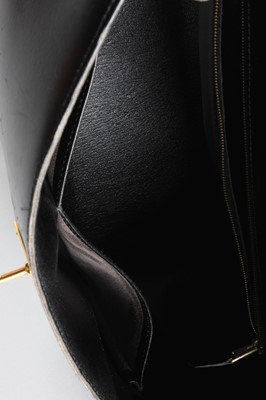 Lot 21 - An Hermès black box calf leather Kelly bag,...
