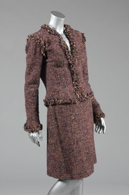 Lot 164 - A Chanel mauve tweed suit, 2003, boutique...