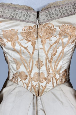 Lot 48 - A Charles Frederick Worth brocaded satin...