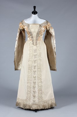 Lot 48 - A Charles Frederick Worth brocaded satin...