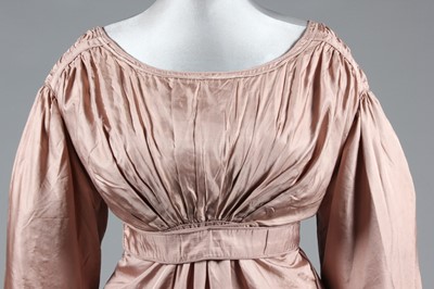 Lot 42 - A fine old-rose silk walking dress, 1820s,...