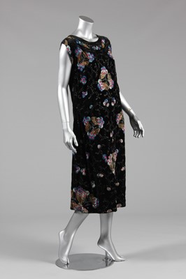 Lot 80 - An embroidered and beaded black velvet dress,...