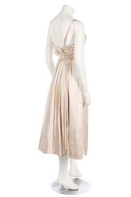 Lot 34 - A Paquin oyster-coloured satin cocktail dress,...