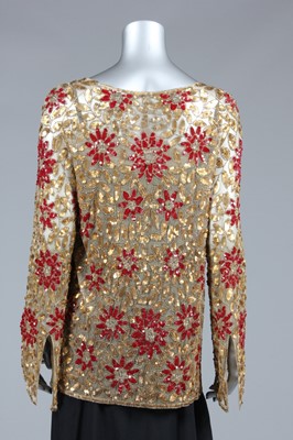 Lot 56 - A gold and wine sequined evening jacket, late...