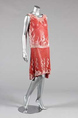 Lot 57 - A good coral-pink muslin beaded flapper dress,...