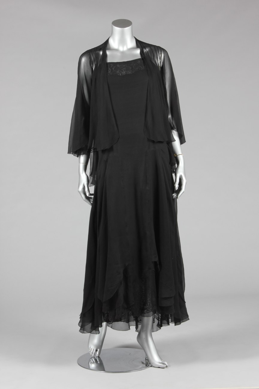 Lot 61 - A Chanel couture black chiffon evening jacket