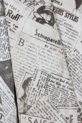 Lot 77 - A Schiaparelli newspaper-print silk tie for...
