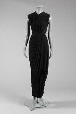Lot 79 - A Madame Grès black draped silk jersey evening...