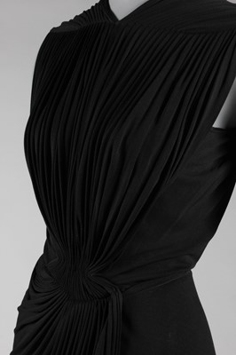 Lot 79 - A Madame Grès black draped silk jersey evening...