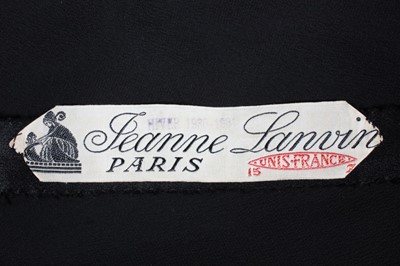 Lot 82 - A Jeanne Lanvin couture black satin crpe...