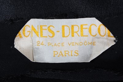Lot 83 - An Agnes-Drecoll couture black crpe dinner...