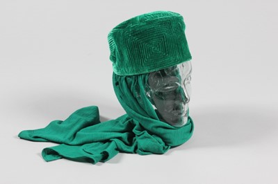 Lot 100 - A Balenciaga jade-green velvet hat, probably...