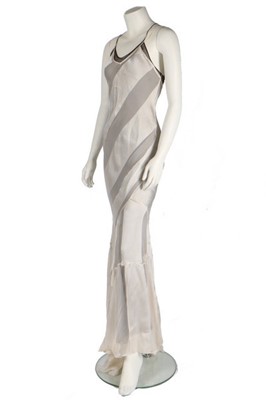 Lot 287 - A John Galliano sheer ivory striped gauze bias-...