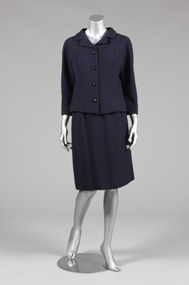 Lot 102 - A Balenciaga couture navy wool suit, February...
