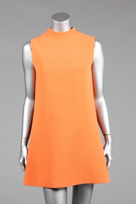 Lot 105 - A Pierre Cardin tangerine wool crpe mini-dress,...