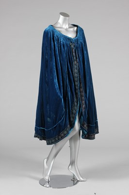 Lot 80 - An Eva Luibel blue velvet evening cape, circa...