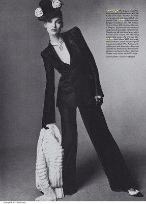 Lot 274 - A John Galliano satin trouser suit, 'Black'...