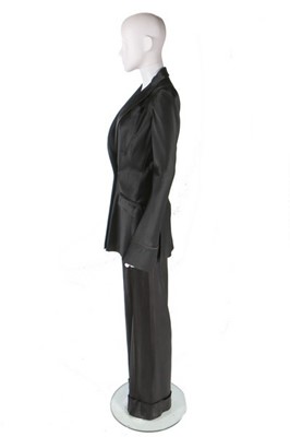 Lot 274 - A John Galliano satin trouser suit, 'Black'...