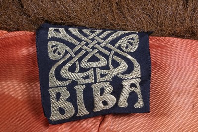 Lot 120 - A Biba faux 'orangutan' fur coat, late 1960s,...