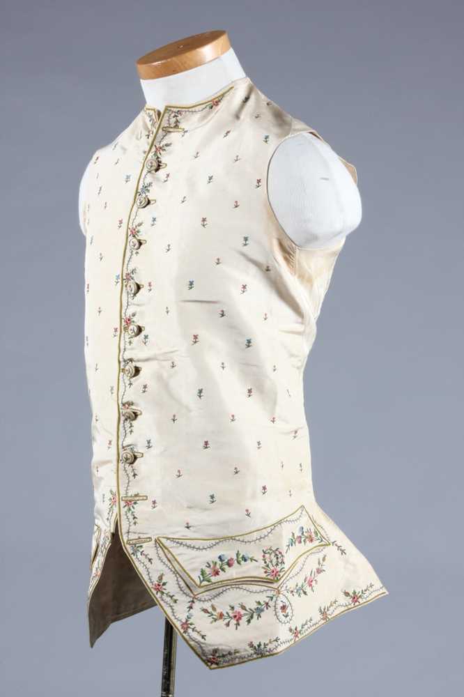 Lot 149 - An embroidered ivory silk waistcoat, 1770s,...