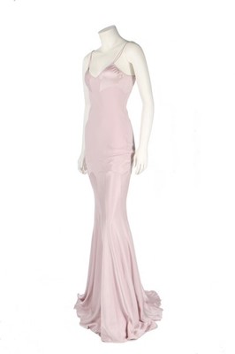 Lot 276 - A John Galliano pale pink bias-cut gown,...