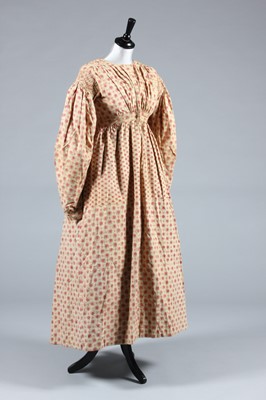 Lot 151 - A printed cotton day dress, late 1830s, the...