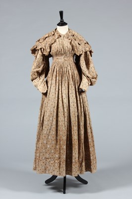 Lot 153 - A printed cotton day dress and fichu, circa...