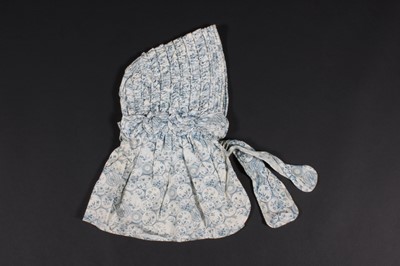 Lot 518 - A group of caps and bonnets, 19th century,...