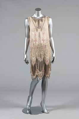 Lot 166 - A beaded pale pink chiffon flapper dress,...