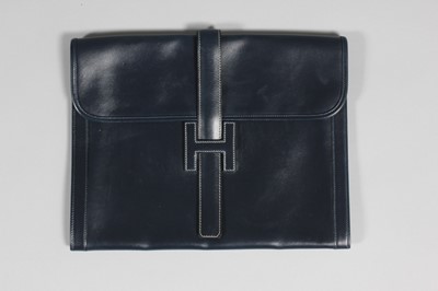 Lot 167 - An Hermès navy leather pochette, 1970s,...