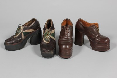 Lot 168 - Five pairs of men's platform shoes, early...